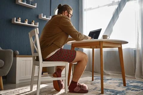 Bizarre guy geek working online Stock Photos