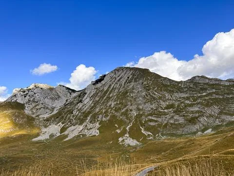 The bizarre mountain consists of layers of stone covered with fine bushes Foto stock