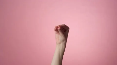 Bla-bla-bla gesture on pink background 库存影片 171542114