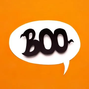 Black 3d text boo inside a speech bubble on orange background Stock Photos