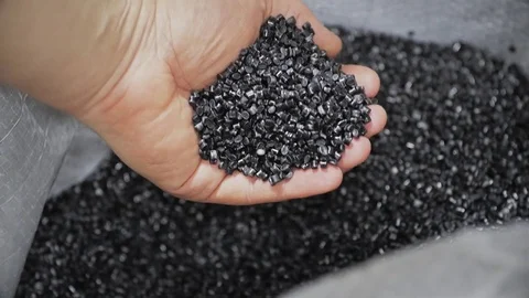 Black ABS plastic pellets Stock Footage
