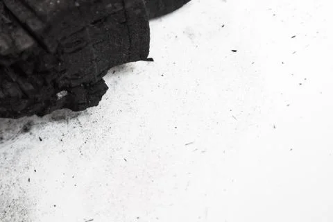 Black abstract textured composition on a white background, a selected focus c Stock Photos
