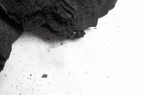Black abstract textured composition on a white background, a selected focus c Stock Photos