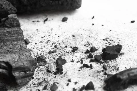 Black abstract textured composition on a white background, a selected focus c Stock Photos