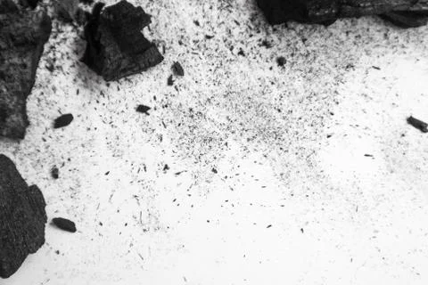 Black abstract textured composition on a white background, a selected focus c Stock Photos