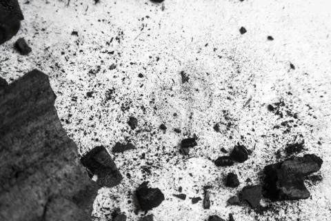 Black abstract textured composition on a white background, a selected focus c Stock Photos