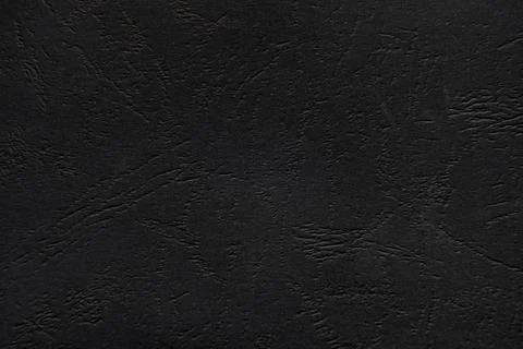 Black abstract textured surface creating a dark background Stock Photos
