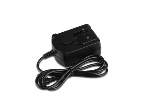 Black  adapter. New condition. Close-up. Isolated Stock Photos