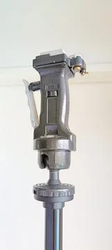 Black adjustable tripod stand and mounted support head Stock Photos
