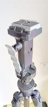 Black adjustable tripod stand and mounted support head Stock Photos