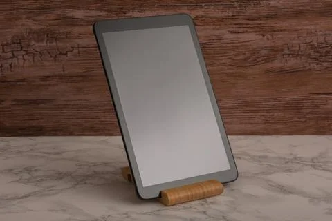Black advanced smart home control panel mounted on a wooden base and dark b.. Stock Photos