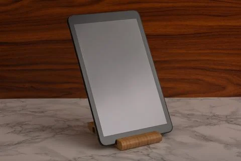 Black advanced smart home control panel mounted on a wooden base and dark b.. Stock Photos