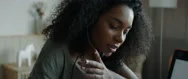 Black African American Female Working From Home, Having A Phone Call With Client Stock Footage