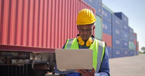 Black African man engineer control checking container from cargo Video stock 170830700