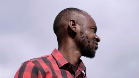 Black African man looking around - thoughts, curiosity Stock-Footage 88550870