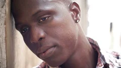 black-african-young-man-sad-footage-080892487_iconm.jpeg