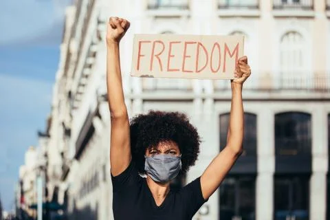 Black afro woman on demonstration against police brutality Stock Photos