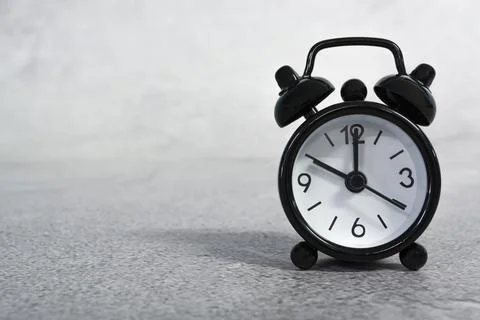 Black alarm clock isolated. The clock set at 10 o'clock. Deadline concept. 스톡 사진