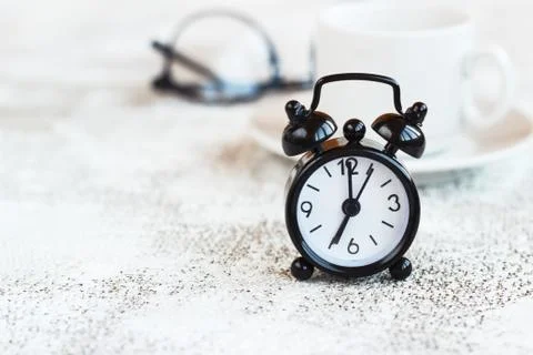 Black alarm clock on white background,concept morning Stock Photos