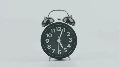 Black Analog Alarm Clock Ringing at Five AM or PM or Midnight or Noon Stock Footage 299129784