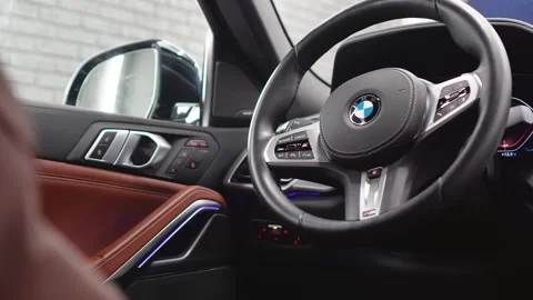 Black and beige leather interior of the BMW X6 G06. Stock Footage 331529816
