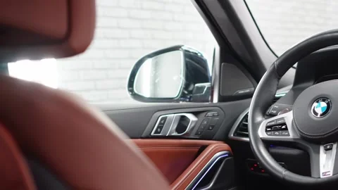 Black and beige leather interior of the BMW X6 G06. Stock Footage 331529821