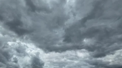 Black and gray clouds cover the sky. Clouds are approaching before a storm .. Stock Footage 337016052