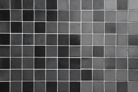 Black and gray tiled background Stock Photos