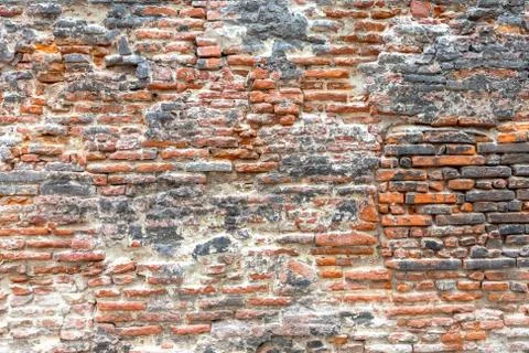 Black and orange brick texture. Stock Photos
