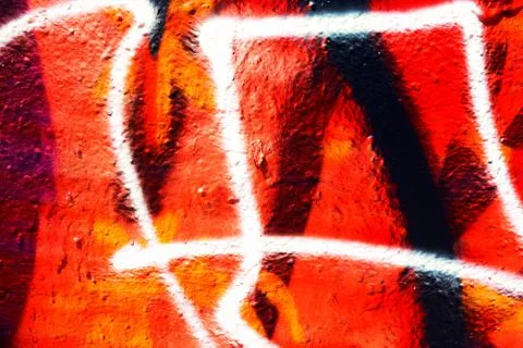 Black and orange sprayed wall texture Stock Photos