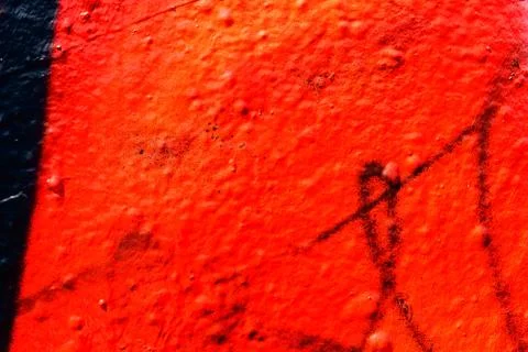 Black and orange sprayed wall texture Stock Photos