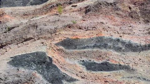Black and Red Coal Mine Spoil Tip Close Up Industrial Mining Landscape Stock Footage 340273488