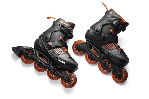 Black And Red Inline Roller Skates With Red Wheels For Fitness And Fun Adventure Stock Photos