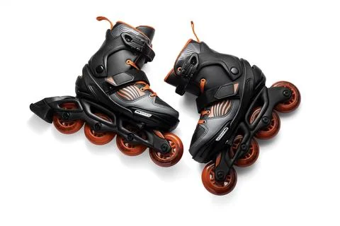 Black And Red Inline Roller Skates With Red Wheels For Fitness And Fun Adventure Stock Photos