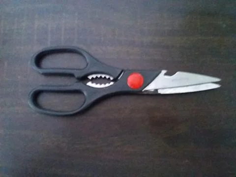 Black and red scissors Stock Photos