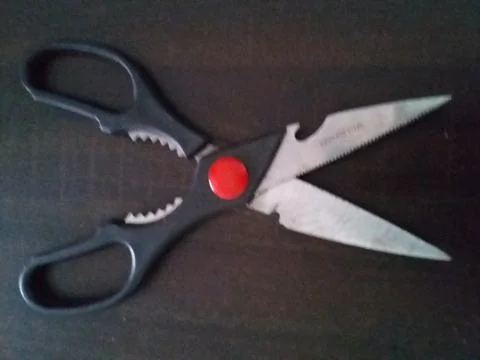 Black and red scissors Stock Photos