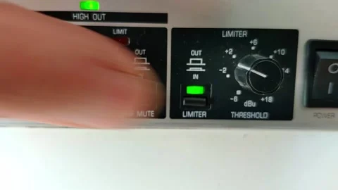 Black and silver audio device with knobs and rectangular LED feedback 動画素材 145765381