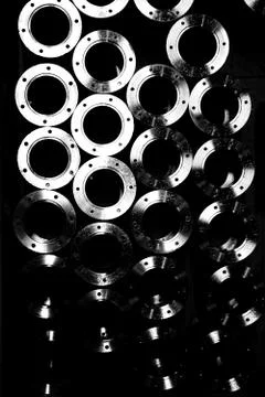 Black and white abstract stack of round metal parts Stock Photos