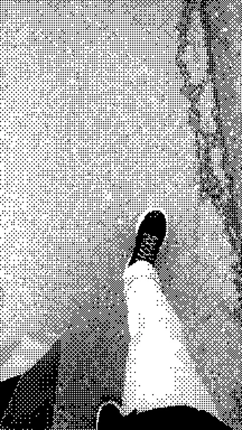 Black and white animation of walking feet on cracked pavement. Stock Footage 308520252