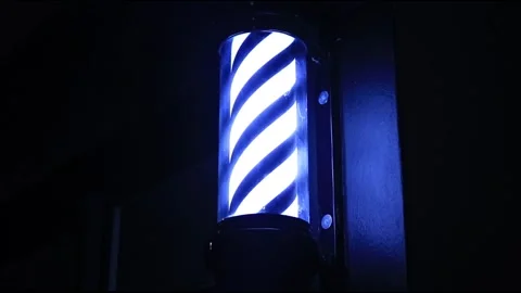 Black and White Barber Pole Rotating at Night Stock Footage 248792248