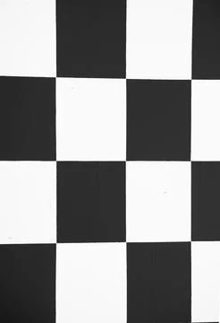 Black and white checker pattern in vertical composition Stock Photos