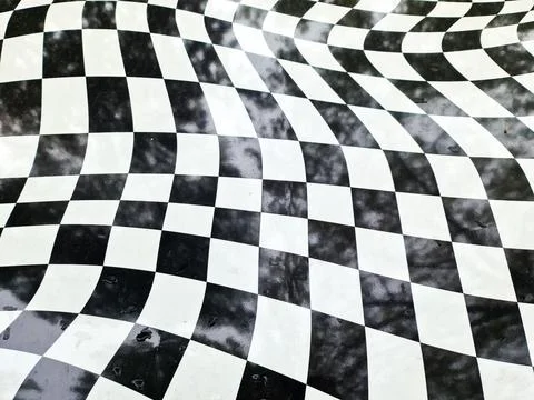Black and white checkerboard pattern creating optical illusion Stock Photos