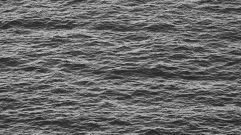 A black and white clip of complex wave patterns in the ocean. Stock Footage 169263383