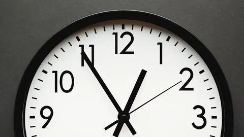 Black and white clock face. Time ticking on classic wall clock. Timelapse. Stock Footage 295027105