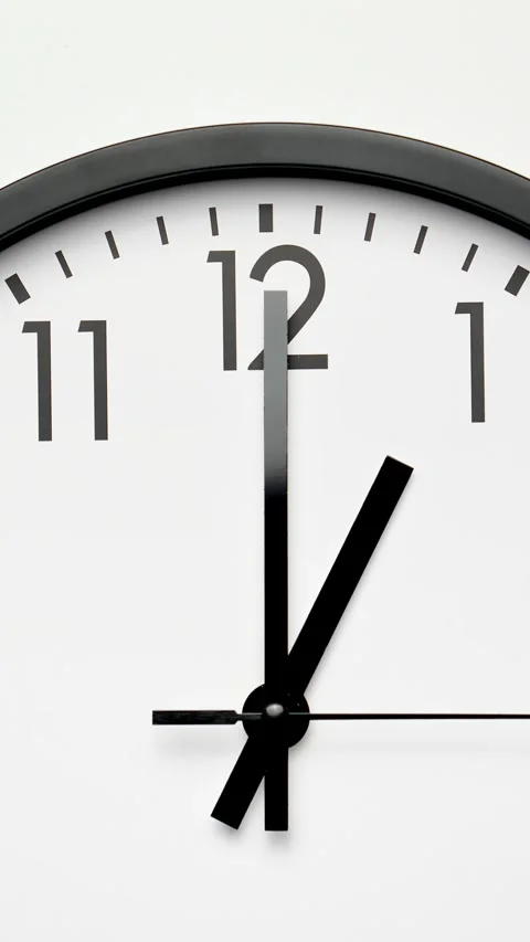 Black and white clock face. Time ticking on classic wall clock. Timelapse. Stock Footage 302059544