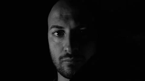Black and white Close up portrait. 4k, young man wears medical mask. Video stock 145452335