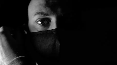 Black and White Close up portrait. 4k, The young man takes off his medical mask. Stock Footage 145491960