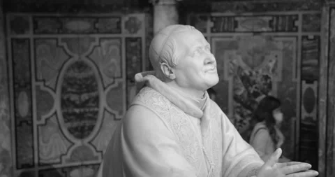 Black and white close up shot of sculpture of Pope Pius IX in front of the Stock Footage 197310628