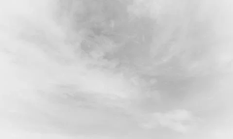 Black and white clouds in the sky. Background with space for copywriting. Stock Photos