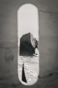 Black And White Creative Frame View Of Penedo Do Guincho Sea Stack - Santa Cruz Stock Photos